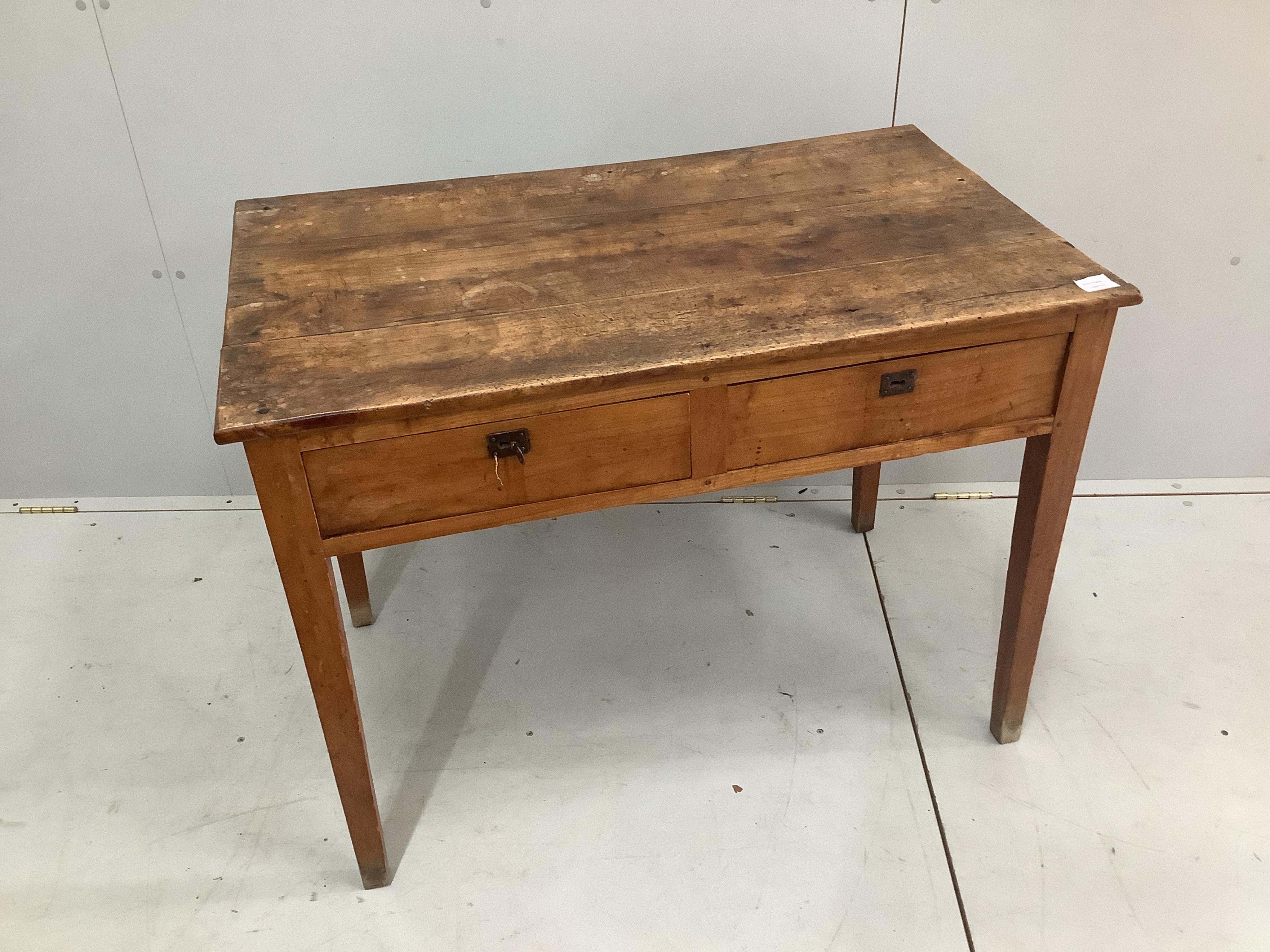 A mid 19th century Continental rectangular fruit wood side table with two drawers, width 97cm, depth 59cm, height 73cm. Condition - fair